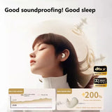 Side sleeper wearing earbuds