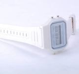 Men's white LED digital military watch with white silicone band on light gray background, vintage digital wristwatch.
