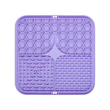 Purple silicone mat with textured design on a white background
