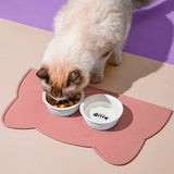 Cat eating from a pink pet feeding mat – waterproof non-slip placemat