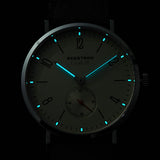 White dial brown band watch
