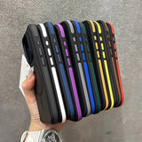 Hand holding a stack of colorful phone cases against a gray background