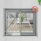 Customizable magnetic window screen mesh curtain installed on a living room window, blocking mosquitoes and insects while letting fresh air in