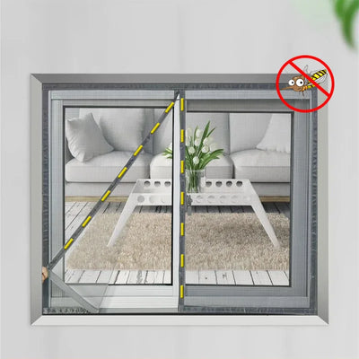 Customizable magnetic window screen mesh curtain installed on a living room window, blocking mosquitoes and insects while letting fresh air in