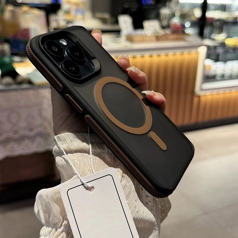 Phone case with a tag held by a hand in an indoor setting