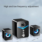 Wired desktop speakers with high and low frequency adjustment, featuring a sleek design and vibrant LED lighting.