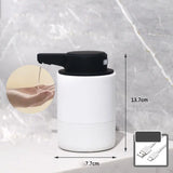 White touchless automatic soap dispenser with infrared sensor on marble surface, dimensions shown
