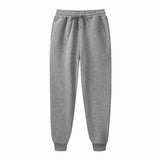 Men's gray jogger sweatpants full length view on white background