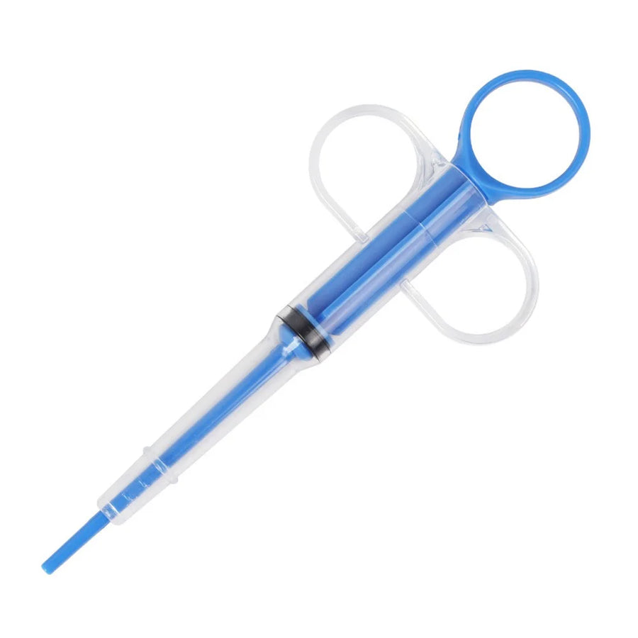 Blue pet pill feeder syringe with finger-ring plunger and soft tip on white background – pill dispenser for dogs and cats