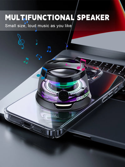 Mini Magnetic Bluetooth Speaker - multifunctional speaker on smartphone with laptop in background