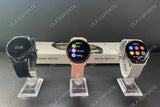 Three Women's Smart Watch 6 smartwatches on stands with a branded box in background