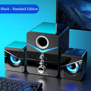 Wired desktop speakers with a sleek design and illuminated volume control, perfect for enhancing your audio experience.