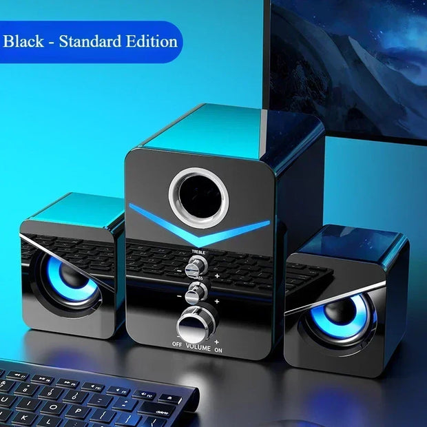 Wired desktop speakers with a sleek design and illuminated volume control, perfect for enhancing your audio experience.