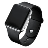 Black LED digital sport watch with silver frame and black silicone band on white background, side view of unisex casual watch.