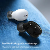 White and black wireless earbuds on a blue textured surface with text about design and functionality.