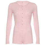 Pink long sleeve button-front romper with short legs and round neckline, flat lay on a white background
