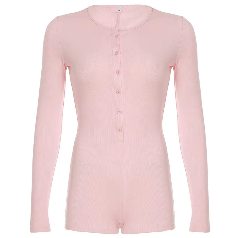 Pink long sleeve button-front romper with short legs and round neckline, flat lay on a white background