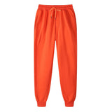 Mens fleece lined jogger sweatpants – orange sweatpants on white background