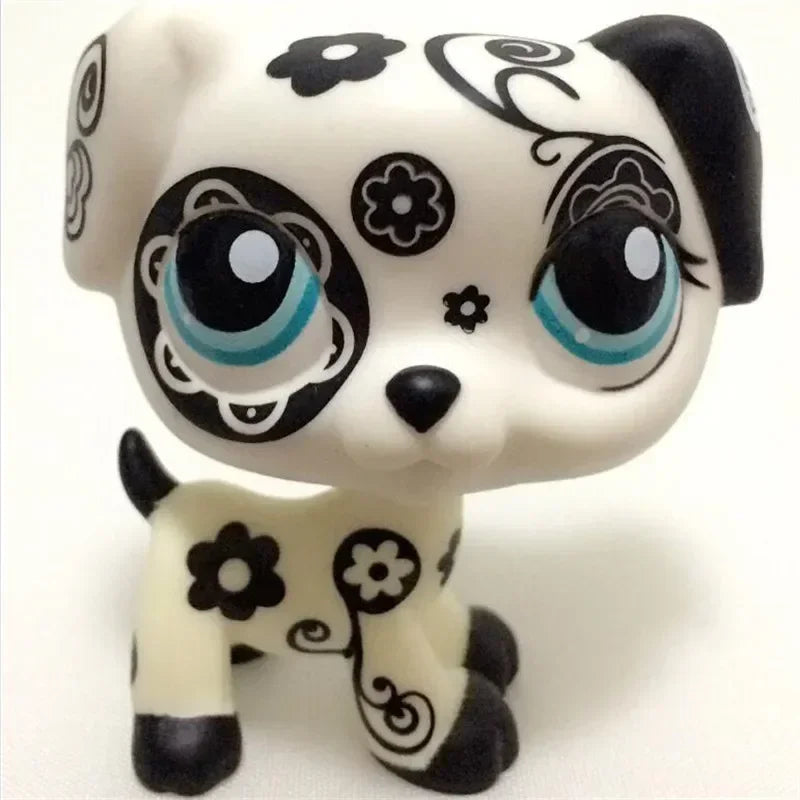 Mini pet shop puppy figure – white with black floral and swirl patterns and blue eyes