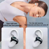 Woman wearing open-ear clip-on earbud, shown in multiple colors