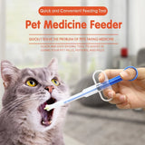Pet pill feeder being used to give medicine to a cat – soft tip pill syringe dispenser for dogs and cats