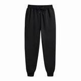 Men's black jogger sweatpants full length view on white background