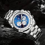 Men's quartz chronograph watch with blue dial and silver alloy band on a dark rocky background, featuring the brand 'NOTIONR'.
