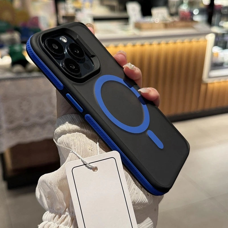 Black phone case with blue accents held by a person, with a blurred indoor background.