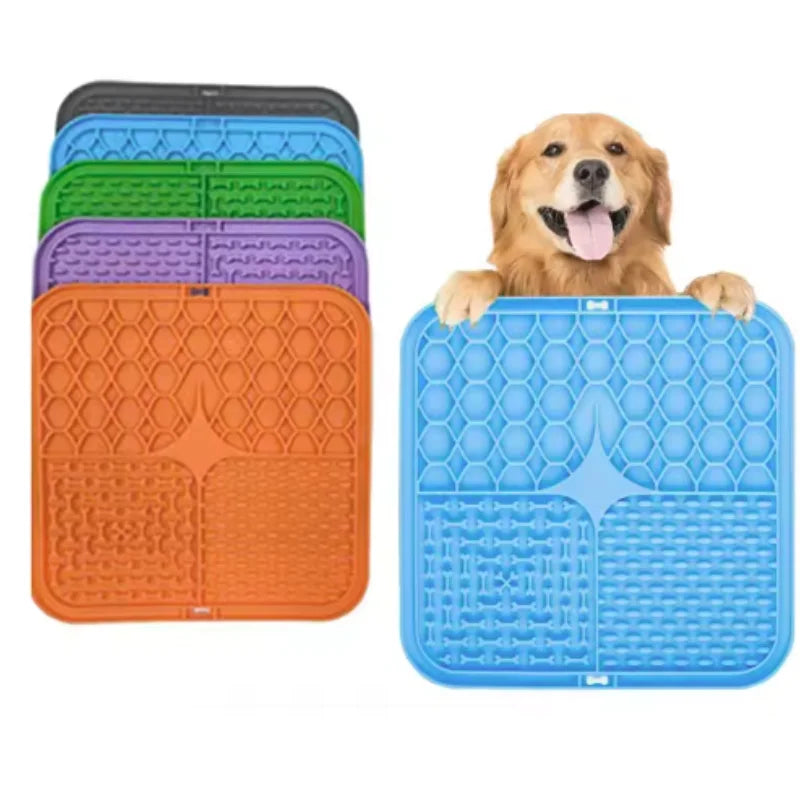 Dog with a blue mat and other colored mats on a white background