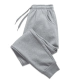 Men's gray casual jogger sweatpants on white background