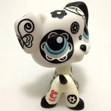 Mini pet shop puppy figure – white with black floral and swirl patterns and red printed lettering on its leg