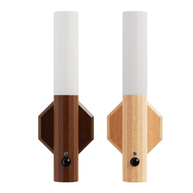 Pair of wood grain magnetic motion sensor wall sconces with white cylindrical shades on white background
