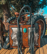 Tooled leather and cowhide western crossbody handbag with turquoise stone, braided handles and fringe